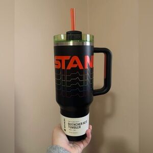 Stanley Black Tumbler with Green Lid and Orange Straw